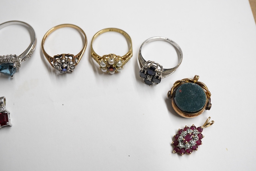 A small group of jewellery to include, four modern 9ct gold and gem set rings including garnet and seed pearl cluster and sapphire and diamond cluster, one other modern 9k and gem set ring, five assorted 9ct and gem set